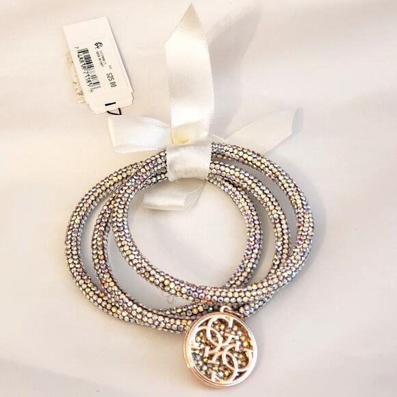 Guess Jewelry - GUESS Silver & Rose Gold Tone Set of 3 Sparkle Bangles with Logo Charm